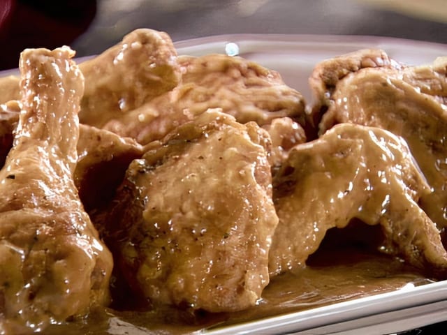 Smothered Fried Chicken.